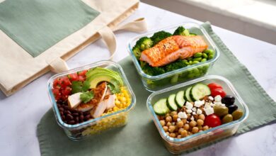 High-Protein Lunch Ideas for Work: 20 Easy Make-Ahead Meals 13 High-Protein Lunch Ideas for Work: 20 Easy Make-Ahead Meals Grab-and-go high-protein lunch meal prep containers with chicken burrito bowl, salmon and quinoa bowl, and Mediterranean chickpea bowl next to a canvas lunch tote