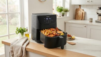 Modern air fryer with crispy golden food
